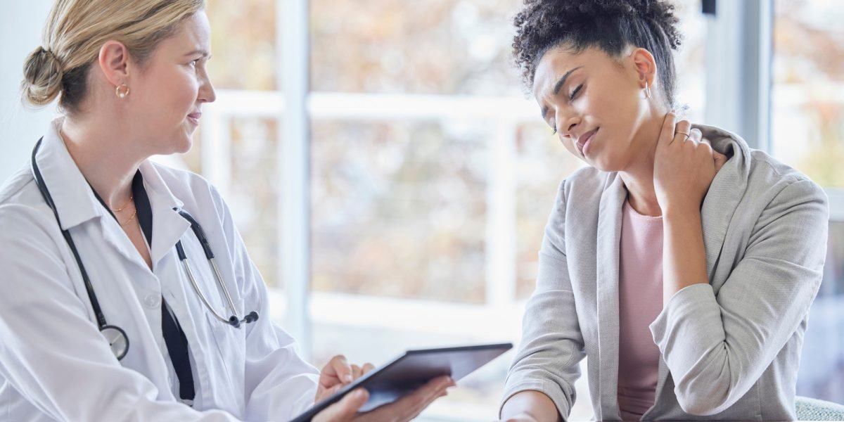 Consulting, neck pain and medical with black woman and doctor for injury, healthcare and physical t